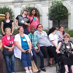 DC RAMP young people sitting in front of a building